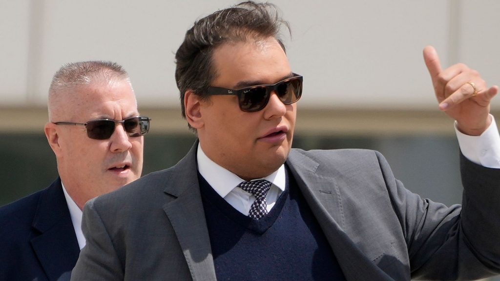 Former US Rep. George Santos sentenced to more than 7 years in prison