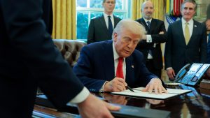 Trump signs executive order targeting state climate laws