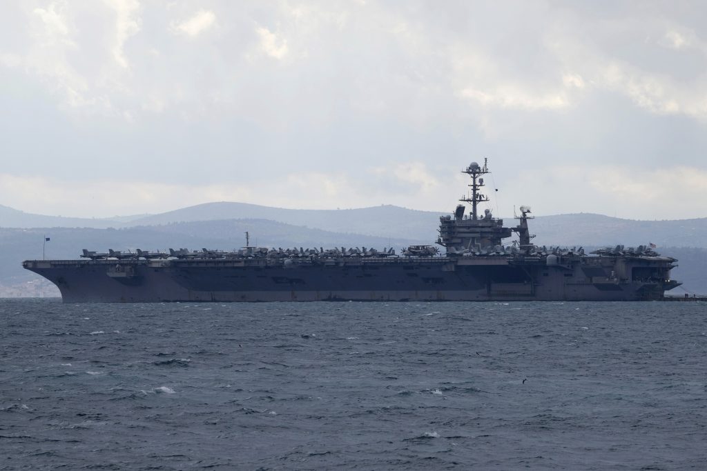 Fighter jet slips off carrier hangar deck in Red Sea, one minor injury