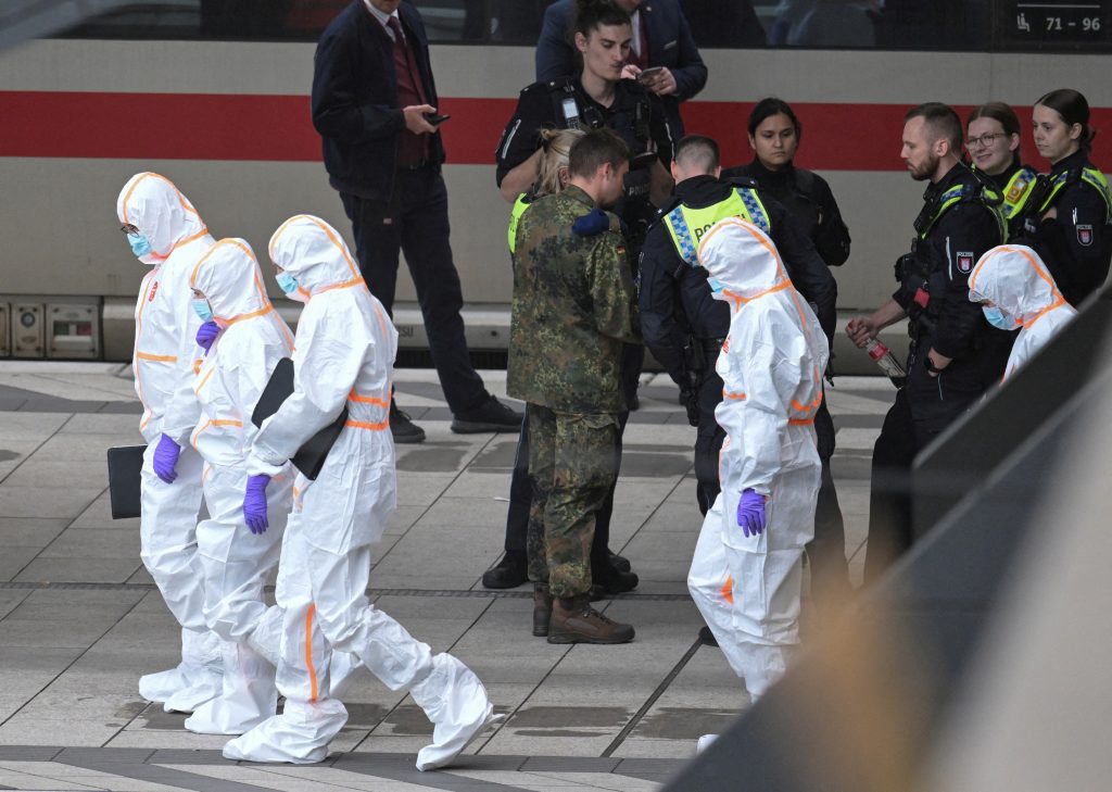 Woman, 39, in custody after stabbing of 18 people at Hamburg train station