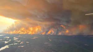 Thousands evacuated as wildfires rage across Canada, US sends firefighters