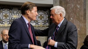 Senators push sweeping Russia sanctions as Trump urges caution