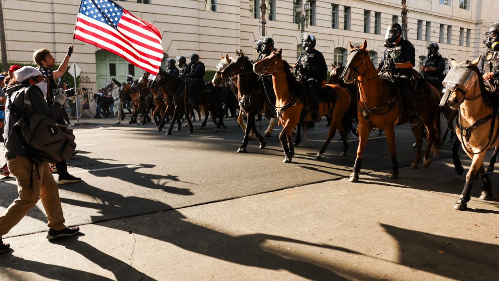 California proposes ban on some law enforcement wearing face masks
