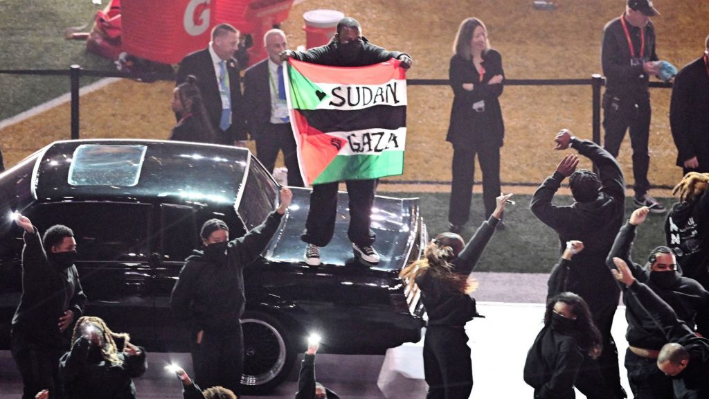 Super Bowl performer who waved ‘Sudan and Free Gaza’ flag at halftime arrested