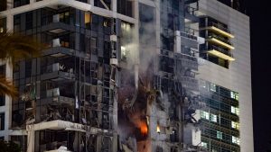 Iranian missiles hit Tel Aviv as Israel, US defend retaliation strike