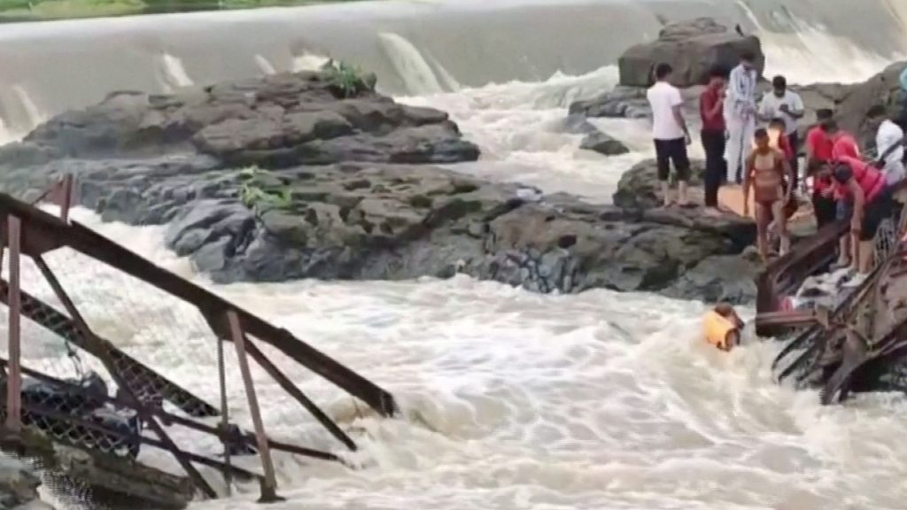 Rescue workers search for survivors in bridge collapse in India