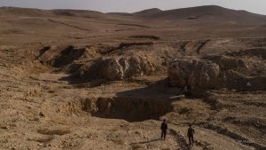 ‘A crime that shocks the mind’: Iraq exhumes mass grave site left by ISIS