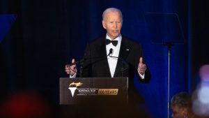 Biden says Trump has ushered in ‘dark days’ in sharpest post-office criticism