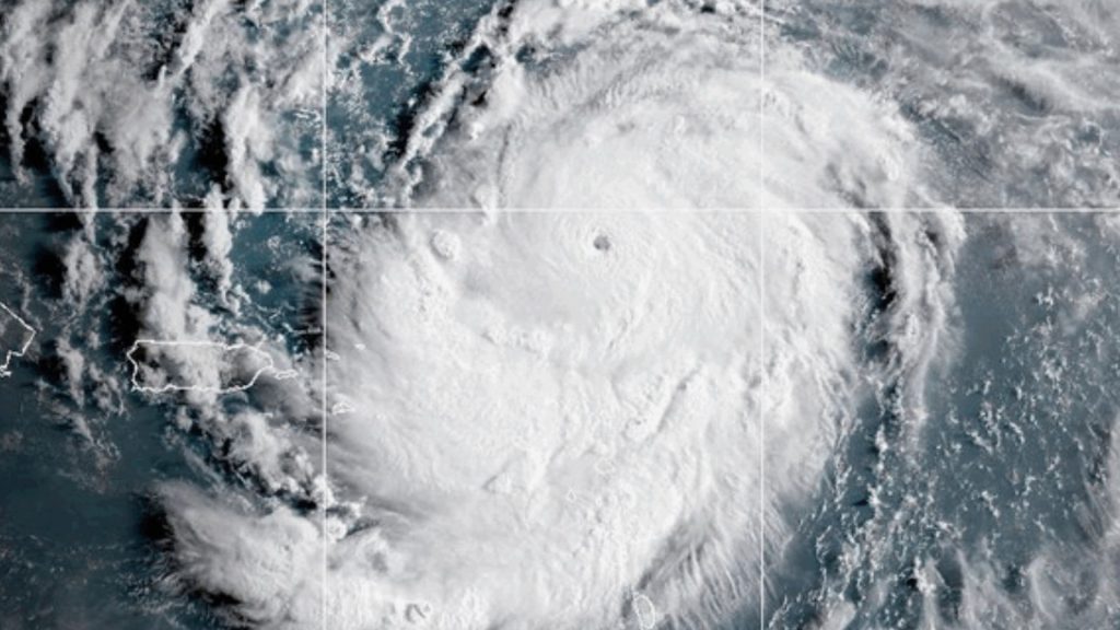 Hurricane Erin churns toward East Coast with dangerous surf, 130 mph winds