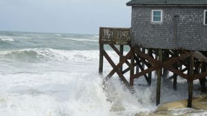 Flooding, beach closures as Hurricane Erin brushes East Coast