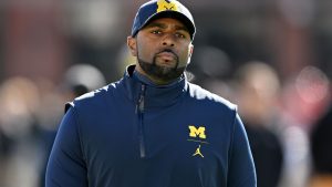 Michigan hit with historic fine for ‘KGB’ sign stealing, keeps 2023 national title