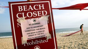 ‘Nobody wants to swim in poopy water’, experts warn Labor Day beachgoers