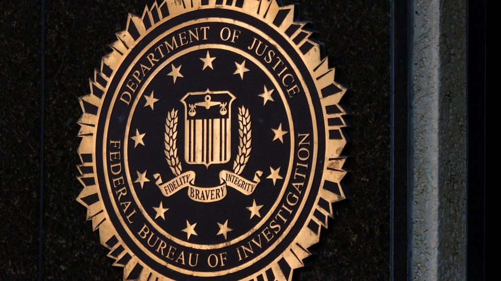 Suspect caught after crashing car into FBI field office gate: Officials