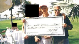 Trump signature on Epstein check disputed in latest document dump