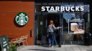 Starbucks to cut jobs, close hundreds of stores in major restructuring