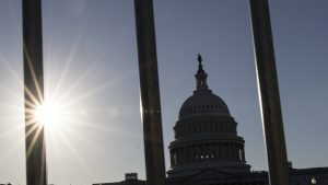 Federal workers see first payday without a check as shutdown drags on