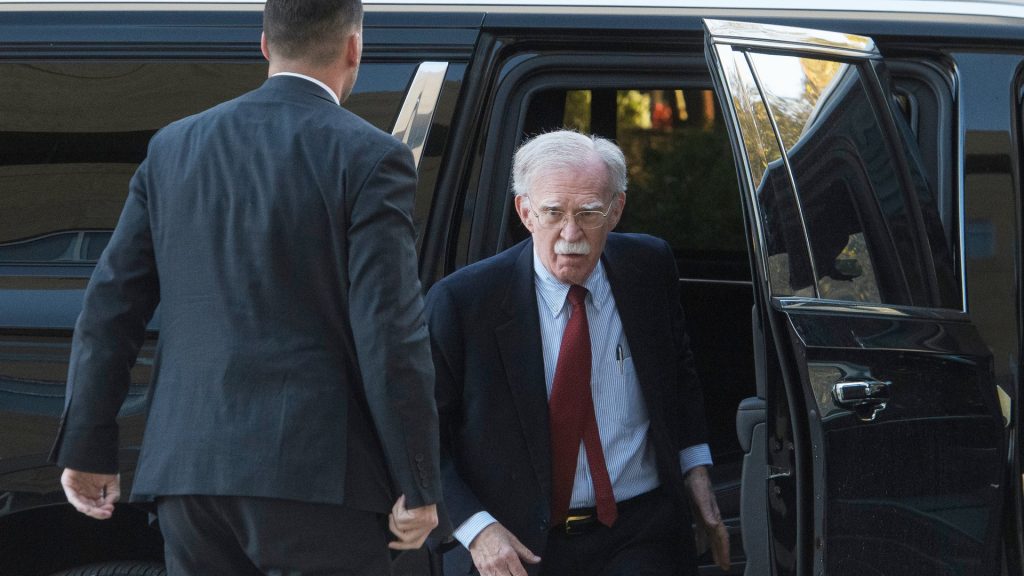 John Bolton surrenders to authorities, pleads not guilty