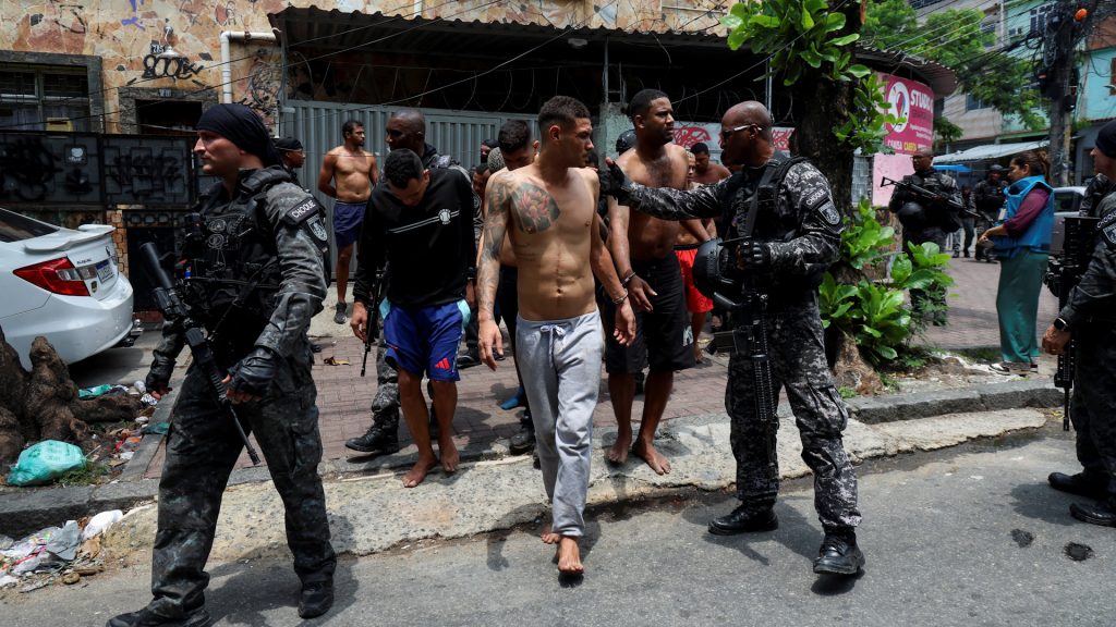 Dozens of suspects and police killed in massive raid on powerful Rio gang