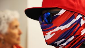 Trump administration sues California over mask ban for federal agents