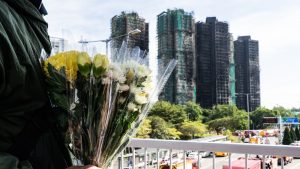 Death toll rises to 128 in Hong Kong high-rise fire as 200 remain missing