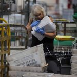 Postal Service ramps up for holiday rush as officials urge customers to ship early