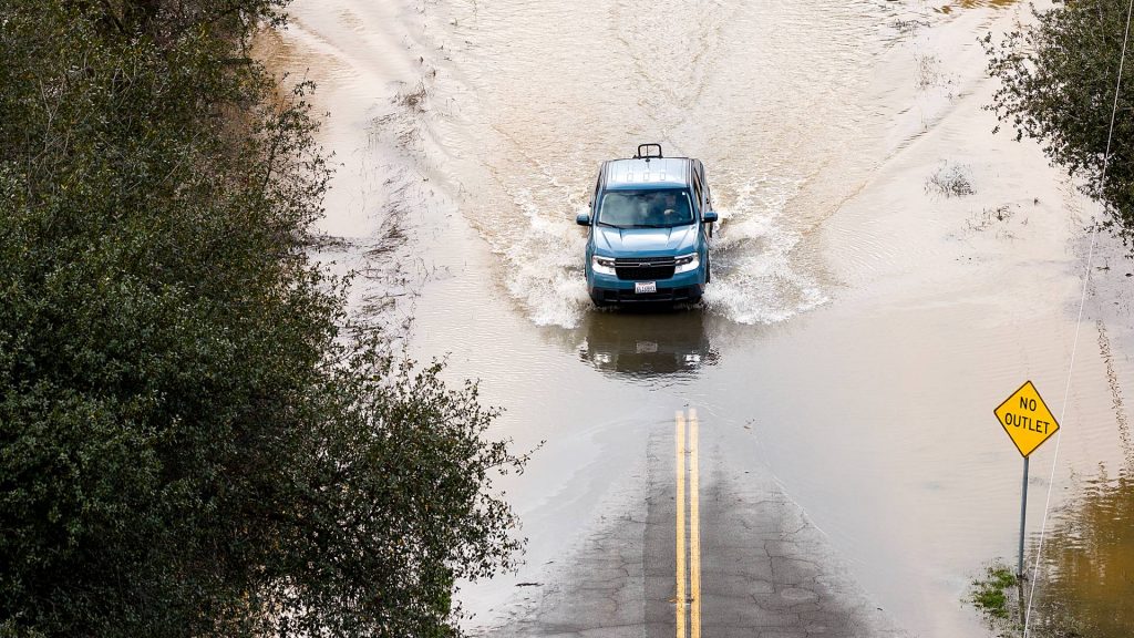 Dangerous holiday storm slams California, flooding threatens travel