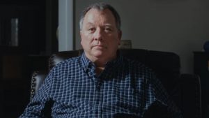 He spent 37 days in jail for reposting a meme about Charlie Kirk. Now this ex-cop has filed a First Amendment lawsuit