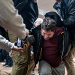 WATCH: Man arrested for attacking Democratic Rep. Ilhan Omar at Minneapolis town hall