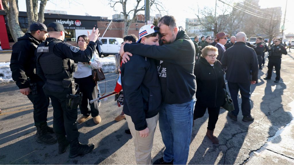 Shooting at Rhode Island high school hockey game kills 3, injures 3