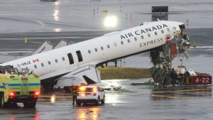 Air Canada jet collides with fire truck at LaGuardia, pilot and co-pilot killed