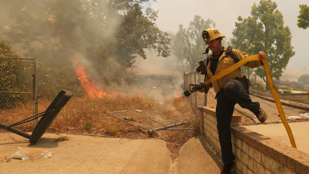 New wildfires threaten homes and historic sites around Southern California