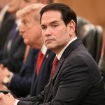 China banned Marco Rubio from visiting. How is he there now with Trump?