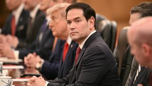 China banned Marco Rubio from visiting. How is he there now with Trump?