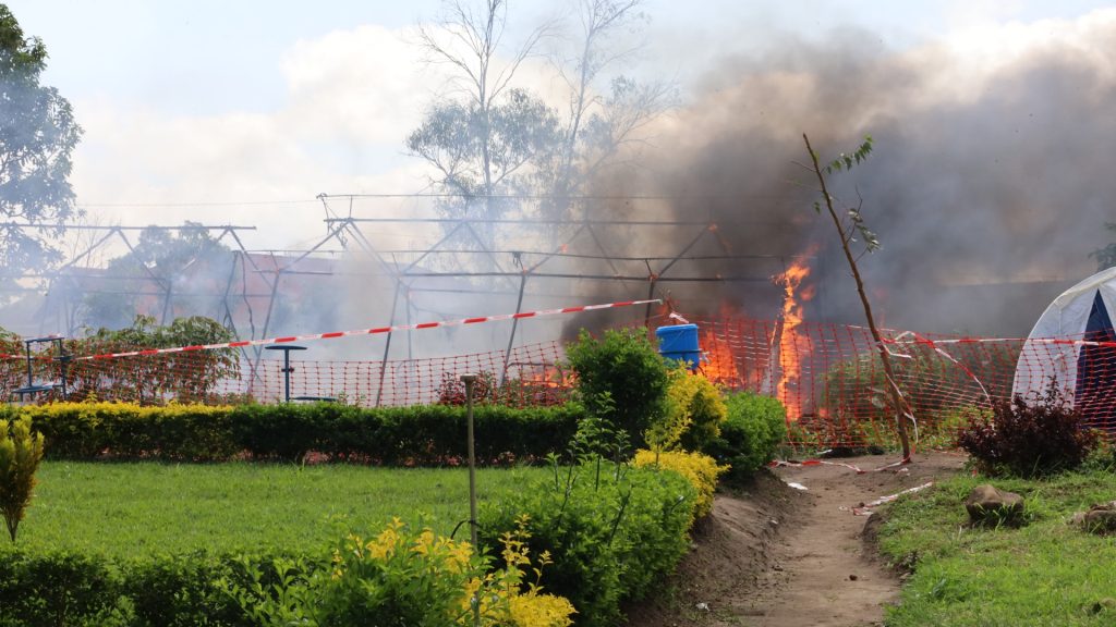 Protesters torch Ebola facility after dispute over burial practices sparks violence