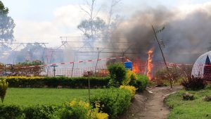 Protesters torch Ebola facility after dispute over burial practices sparks violence