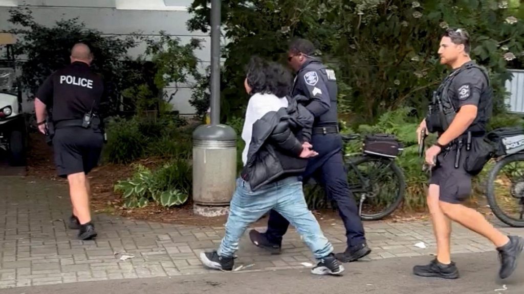 One shooter in custody, another still on the loose after gunfire breaks out at Seattle festival