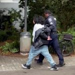 One shooter in custody, another still on the loose after gunfire breaks out at Seattle festival