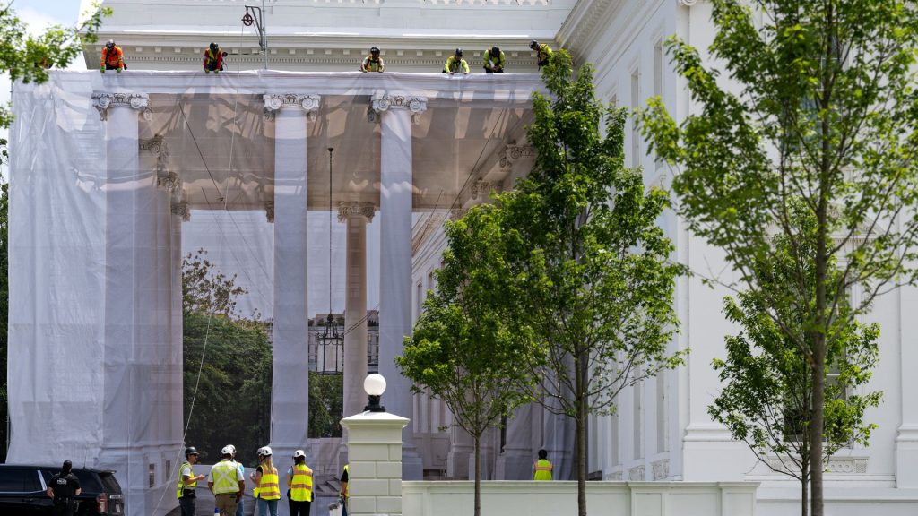 Trump’s latest project: Workers drape off iconic White House columns as part of revamp efforts