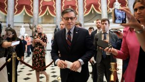 House passes stock trading bill while voter ID provision splits parties