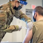 Trump promised redemption for troops who refused COVID shots. A year later, many are still waiting.