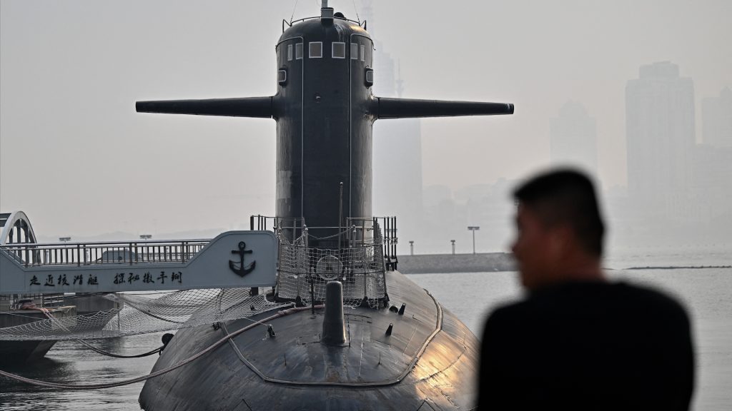China says Pacific missile test was routine. Neighbors raise alarm
