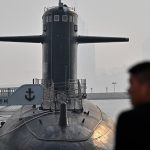 China says Pacific missile test was routine. Neighbors raise alarm