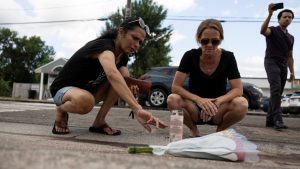 Houston neighborhood looks for answers after fatal ICE shooting