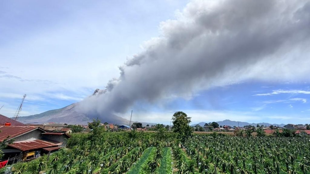 Indonesia’s Mount Sinabung erupts, coats villages in ash as a larger eruption remains possible