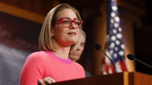 Former Sen. Kyrsten Sinema admits to affair with bodyguard. Can she be sued by his ex-wife?