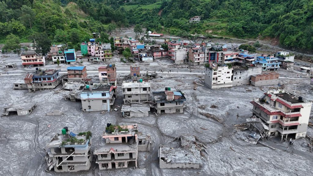 Nepal-Tibet flood death toll tops 900 as mass burials begin, more than 4,700 missing