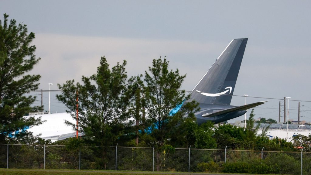 5 dead after cargo plane overruns runway at Miami International Airport, halting flights