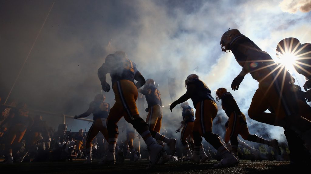 If college athletes can earn millions, should they be fined like the pros?