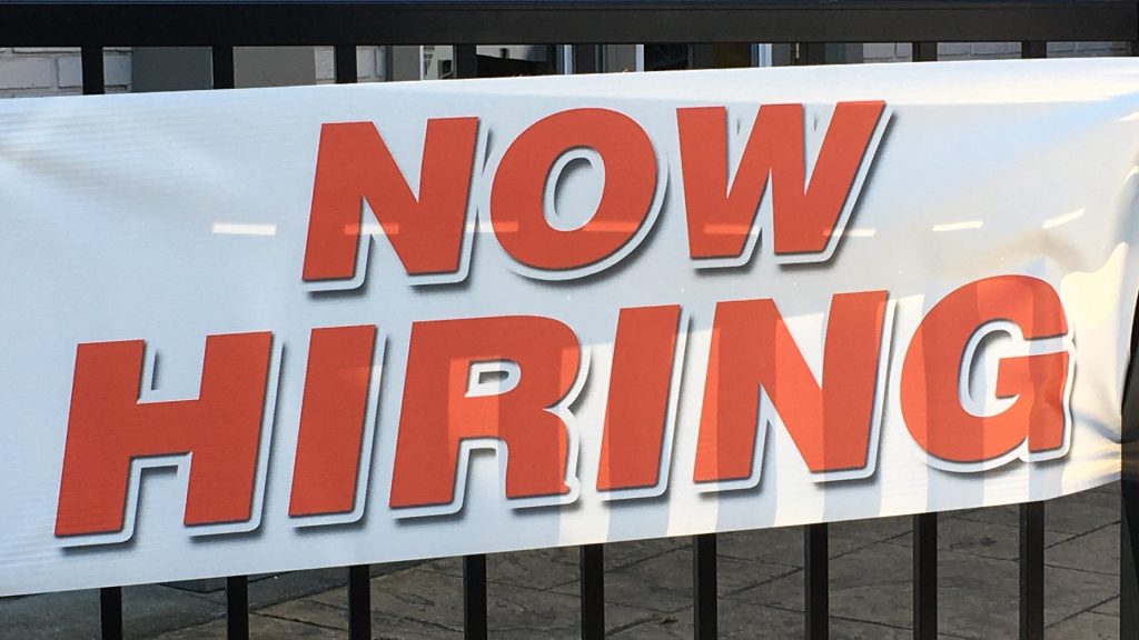 The economy added more jobs than expected. Now the Fed has a harder decision