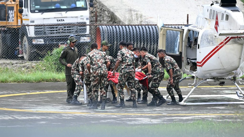 Two workers pulled alive from Nepal tunnel after nine days; more voices heard